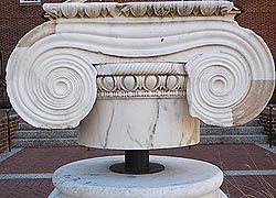 [photo, Latrobe Column Capital, before Miller Senate Office Building, 11 Bladen St., Annapolis, Maryland]